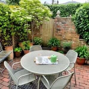 Courtyard gardens create a quiet safe space to enjoy a pot of tea in a busy world