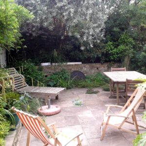 A private secluded space with soft planting and plenty of seating that we maintained in Tunbridge Wells