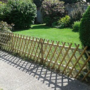 Large diamond trellis provides a secure boundary fence to the front of this property without using solid fencing panels